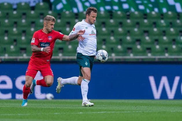 SV Werder Bremen vs 1.FC Heidenheim - Relegation 01 - 02.07.2020 Norman Theuerkauf (1. FC Heidenheim 1846 30), Philipp Bargfrede (Werder Bremen 44) nphgm001: Fussball: 1. Bundesliga: Saison 19 20: Relegation 01; SV Werder Bremen vs 1.FC Heidenheim - 02.07.2020 Foto: gumzmedia nordphoto POOL DFL regulations prohibit any use of photographs as image sequences and or quasi-video. EDITORIAL USE ONLY National and international News-Agencies OUT. Bremen wohninvest Weserstadion Bremen DEUTSCHLAND