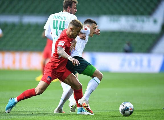 Werder Bremen - 1. FC Heidenheim Fußball, Relegation, Werder Bremen - 1. FC Heidenheim: v.l. Philipp Bargfrede, Niklas Dorsch (Heidenheim), Maximilian Eggestein Photo: Tim Groothuis Witters Pool via xim.gs DFL regulations prohibit any use of photographs as image sequences and or quasi-video. Editorial use only. National and international news agencies out. Bremen Deutschland