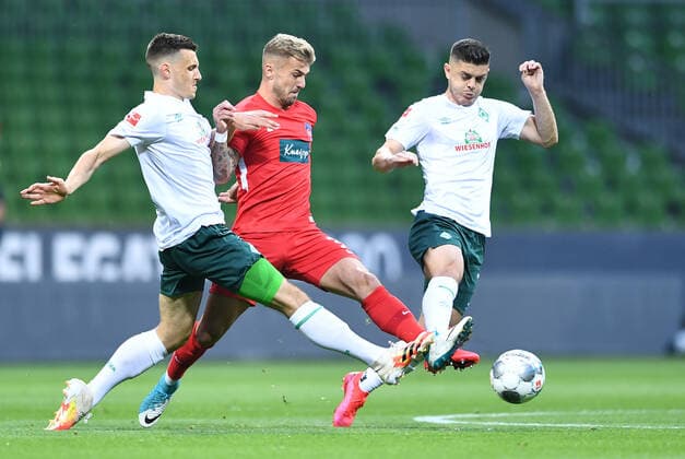Werder Bremen - 1. FC Heidenheim Fußball, Relegation, Werder Bremen - 1. FC Heidenheim: v.l. Maximilian Eggestein (Bremen), Niklas Dorsch, Milot Rashica Photo: Tim Groothuis Witters Pool via xim.gs DFL regulations prohibit any use of photographs as image sequences and or quasi-video. Editorial use only. National and international news agencies out. Bremen Deutschland
