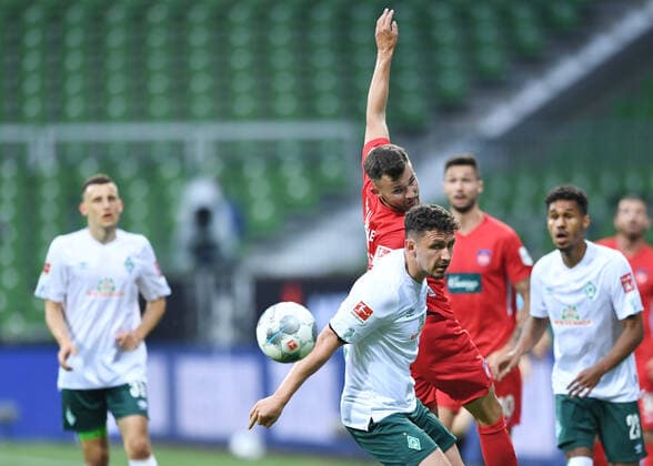 Werder Bremen - 1. FC Heidenheim Fußball, Relegation, Werder Bremen - 1. FC Heidenheim: v.l. Denis Thomalla, Milos Veljkovic (Bremen) Photo: Tim Groothuis Witters Pool via xim.gs DFL regulations prohibit any use of photographs as image sequences and or quasi-video. Editorial use only. National and international news agencies out. Bremen Deutschland