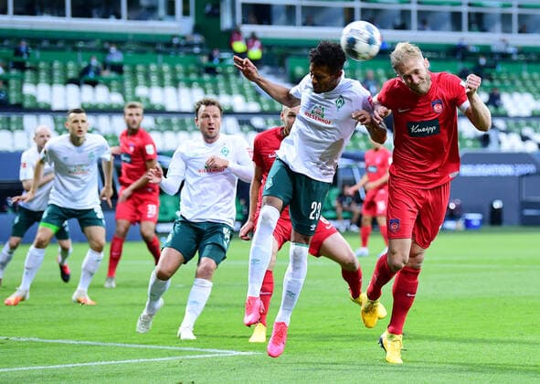 Werder Bremen - 1. FC Heidenheim Fußball, Relegation, Werder Bremen - 1. FC Heidenheim: v.l. Theodor Gebre Selassie (Bremen), Sebastian Griesbeck Photo: Tim Groothuis Witters Pool via xim.gs DFL regulations prohibit any use of photographs as image sequences and or quasi-video. Editorial use only. National and international news agencies out. Bremen Deutschland