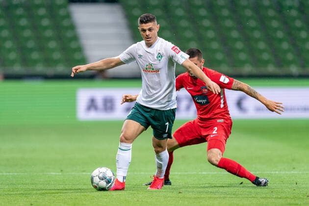 SV Werder Bremen vs 1.FC Heidenheim - Relegation 01 - 02.07.2020 Marnon Busch (1. FC Heidenheim 1846 02), Milot Rashica (Werder Bremen 07) nphgm001: Fussball: 1. Bundesliga: Saison 19 20: Relegation 01; SV Werder Bremen vs 1.FC Heidenheim - 02.07.2020 Foto: gumzmedia nordphoto POOL DFL regulations prohibit any use of photographs as image sequences and or quasi-video. EDITORIAL USE ONLY National and international News-Agencies OUT. Bremen wohninvest Weserstadion Bremen DEUTSCHLAND