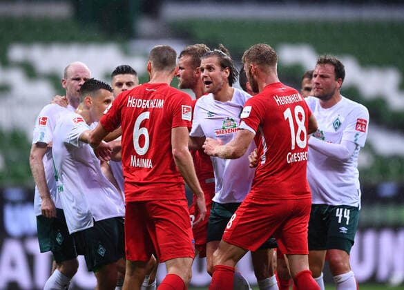 Werder Bremen - 1. FC Heidenheim Fußball, Relegation, Werder Bremen - 1. FC Heidenheim: Rudelbildung: Milot Rashica (Bremen) mit Patrick Mainka (Heidenheim). Photo: Marvin Ibo Güngör GES Pool via xim.gs DFL regulations prohibit any use of photographs as image sequences and or quasi-video. Editorial use only. National and international news agencies out. Bremen Deutschland