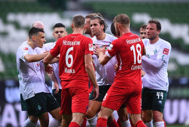 Sport Bilder des Tages Werder Bremen - 1. FC Heidenheim Fußball, Relegation, Werder Bremen - 1. FC Heidenheim: Rudelbildung: Milot Rashica (Bremen) mit Patrick Mainka (Heidenheim). Photo: Marvin Ibo Güngör GES Pool via xim.gs DFL regulations prohibit any use of photographs as image sequences and or quasi-video. Editorial use only. National and international news agencies out. Bremen Deutschland