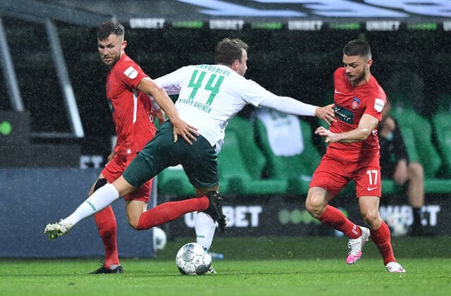 Werder Bremen - 1. FC Heidenheim Fußball, Relegation, Werder Bremen - 1. FC Heidenheim: v.l. Denis Thomalla, Philipp Bargfrede (Bremen), Maurice Multhaup Photo: Tim Groothuis Witters Pool via xim.gs DFL regulations prohibit any use of photographs as image sequences and or quasi-video. Editorial use only. National and international news agencies out. Bremen Deutschland