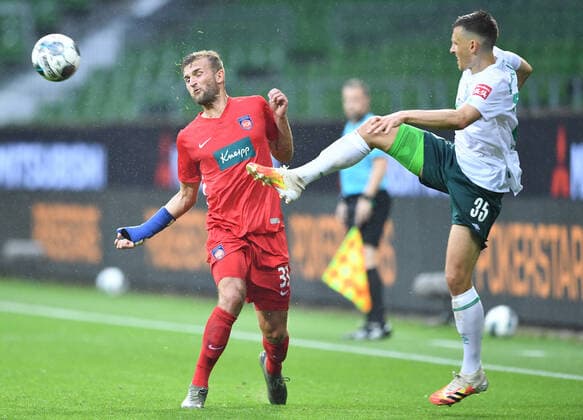 Werder Bremen - 1. FC Heidenheim Fußball, Relegation, Werder Bremen - 1. FC Heidenheim: v.l. Timo Beermann, Maximilian Eggestein (Bremen) Photo: Tim Groothuis Witters Pool via xim.gs DFL regulations prohibit any use of photographs as image sequences and or quasi-video. Editorial use only. National and international news agencies out. Bremen Deutschland