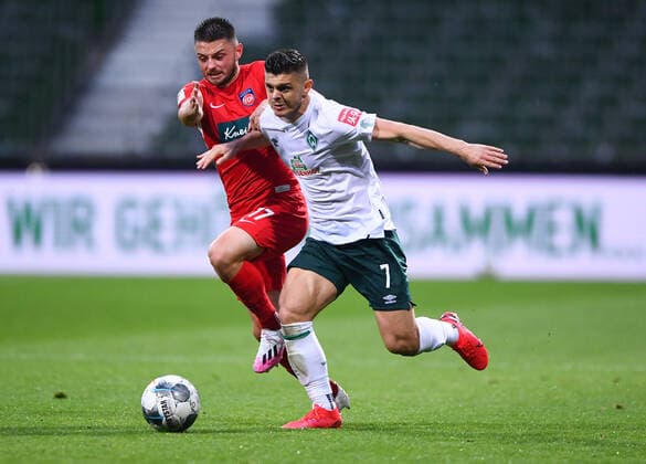 Werder Bremen - 1. FC Heidenheim Fußball, Relegation, Werder Bremen - 1. FC Heidenheim: Zweikampf, Duell Milot Rashica (Bremen) gegen Maurice Multhaup (Heidenheim). Photo: Marvin Ibo Güngör GES Pool via xim.gs DFL regulations prohibit any use of photographs as image sequences and or quasi-video. Editorial use only. National and international news agencies out. Bremen Deutschland