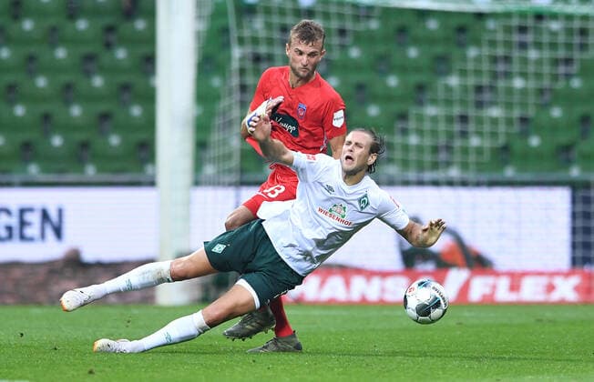 Werder Bremen - 1. FC Heidenheim Fußball, Relegation, Werder Bremen - 1. FC Heidenheim: v.l. Timo Beermann, Niclas Fuellkrug (Bremen) Photo: Tim Groothuis Witters Pool via xim.gs DFL regulations prohibit any use of photographs as image sequences and or quasi-video. Editorial use only. National and international news agencies out. Bremen Deutschland