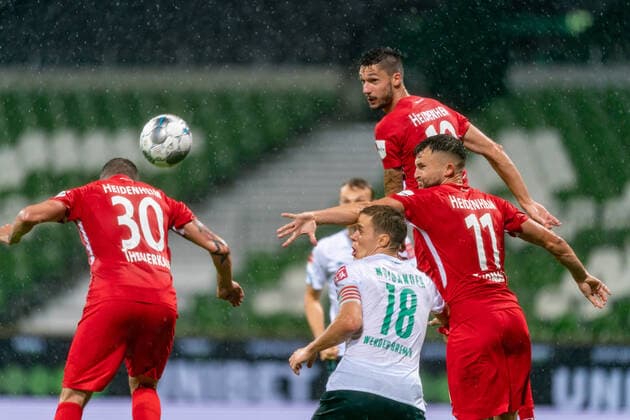 SV Werder Bremen vs 1.FC Heidenheim - Relegation 01 - 02.07.2020 Norman Theuerkauf (1. FC Heidenheim 1846 30), Niklas Moisander (Werder Bremen 18 Kapitaen), Tim Kleindienst (1. FC Heidenheim 1846 10), Denis Thomalla (1. FC Heidenheim 1846 11) nphgm001: Fussball: 1. Bundesliga: Saison 19 20: Relegation 01; SV Werder Bremen vs 1.FC Heidenheim - 02.07.2020 Foto: gumzmedia nordphoto POOL DFL regulations prohibit any use of photographs as image sequences and or quasi-video. EDITORIAL USE ONLY National and international News-Agencies OUT. Bremen wohninvest Weserstadion Bremen DEUTSCHLAND