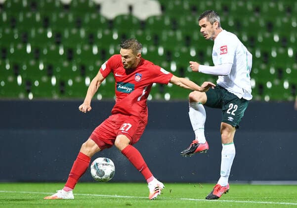 Werder Bremen - 1. FC Heidenheim Fußball, Relegation, Werder Bremen - 1. FC Heidenheim: v.l. Konstantin Kerschbaumer, Fin Bartels (Bremen) Photo: Tim Groothuis Witters Pool via xim.gs DFL regulations prohibit any use of photographs as image sequences and or quasi-video. Editorial use only. National and international news agencies out. Bremen Deutschland
