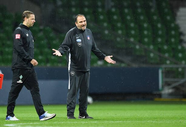 Sport Bilder des Tages Werder Bremen - 1. FC Heidenheim Fußball, Relegation, Werder Bremen - 1. FC Heidenheim: v.l. Trainer Florian Kohfeldt (Bremen), Trainer Frank Schmidt (Heidenheim) Photo: Tim Groothuis Witters Pool via xim.gs DFL regulations prohibit any use of photographs as image sequences and or quasi-video. Editorial use only. National and international news agencies out. Bremen Deutschland