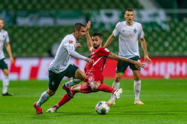 SV Werder Bremen vs 1.FC Heidenheim - Relegation 01 - 02.07.2020 Tim Kleindienst (1. FC Heidenheim 1846 10), Fin Bartels (Werder Bremen 22) nphgm001: Fussball: 1. Bundesliga: Saison 19 20: Relegation 01; SV Werder Bremen vs 1.FC Heidenheim - 02.07.2020 Foto: gumzmedia nordphoto POOL DFL regulations prohibit any use of photographs as image sequences and or quasi-video. EDITORIAL USE ONLY National and international News-Agencies OUT. Bremen wohninvest Weserstadion Bremen DEUTSCHLAND