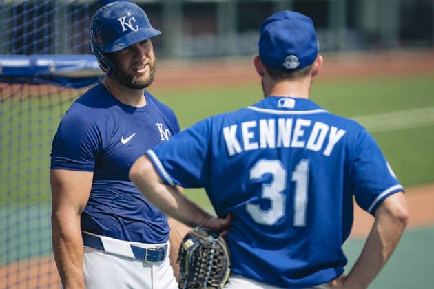 Kansas City Royals left fielder Alex Gordon 4 and relief pitcher Ian Kennedy 31 take the field at the start of Summer Camp training at Kaufman Stadium in Kansas City, Missouri on Friday, July 3, 2020. Major League Baseball is finally starting their 2020 season after the COVID-19 pandemic caused months of delays.  KCP20200703117 KYLExRIVAS