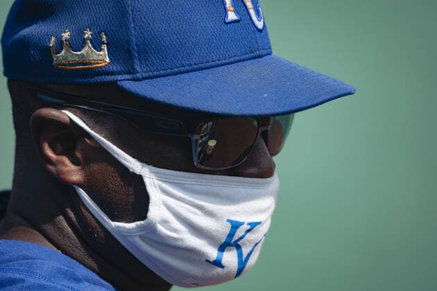 Kansas City Royals hitting coach Terry Bradshaw wears a mask at the start of a Summer Camp training workout at Kaufman Stadium in Kansas City, Missouri on Friday, July 3, 2020. Major League Baseball is finally starting their 2020 season after the COVID-19 pandemic caused months of delays.  KCP20200703115 KYLExRIVAS