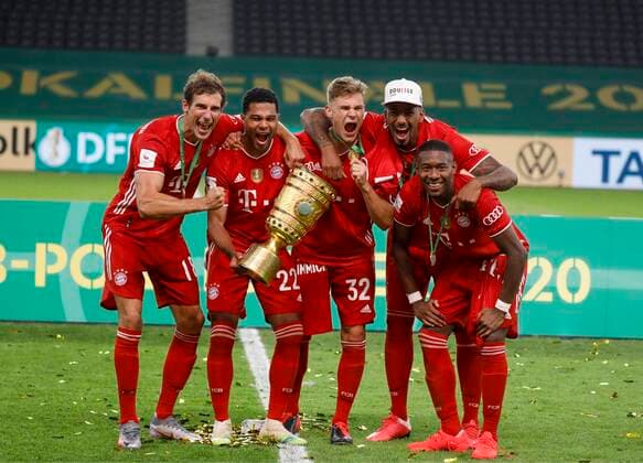 Final German Football Trophy FC BAYERN MUENCHEN - BAYER 04 LEVERKUSEN 4-2 Berlin, Germany, 4 th July 2020, Celebration winner ceremony: Leon GORETZKA, FCB 18 Serge GNABRY, FCB 22 Joshua KIMMICH, FCB 32 Jerome BOATENG (FCB 17) David ALABA, FCB 27 with trophy, at the DFB Pokal Final match FC BAYERN MUENCHEN - BAYER 04 LEVERKUSEN 4-2 in season 2019 2020 , FCB Foto: Hans Rauchensteiner Pool via Peter Schatz - DFB REGULATIONS PROHIBIT ANY USE OF PHOTOGRAPHS as IMAGE SEQUENCES and or QUASI-VIDEO - National and international News-Agencies OUT Editorial Use ONLY Berlin Olympic Stadium Berlin Germany