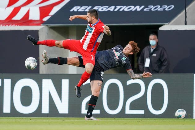 1.FC Heidenheim vs SV Werder Bremen - Relegation 02 - 06.07.2020 Marnon Busch (1. FC Heidenheim 1846 02), Joshua Sargent (Werder Bremen 19) nphgm001: Fussball: 1. Bundesliga: Saison 19 20: Relegation 02; 1.FC Heidenheim vs SV Werder Bremen - 06.07.2020 Foto: gumzmedia nordphoto POOL DFL regulations prohibit any use of photographs as image sequences and or quasi-video. EDITORIAL USE ONLY National and international News-Agencies OUT. Heidenheim Voith-Arena BW DEUTSCHLAND