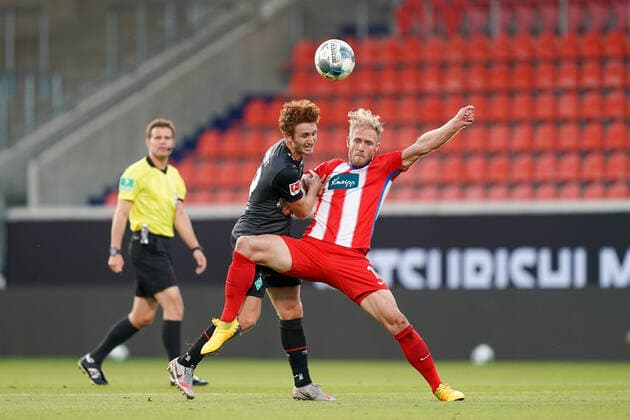 1.FC Heidenheim vs SV Werder Bremen - Relegation 02 - 06.07.2020 Sebastian Griesbeck (1. FC Heidenheim 1846 18), Joshua Sargent (Werder Bremen 19), Dr. Felix Brych (SR) (Schiedsrichter Referee) nphgm001: Fussball: 1. Bundesliga: Saison 19 20: Relegation 02; 1.FC Heidenheim vs SV Werder Bremen - 06.07.2020 Foto: gumzmedia nordphoto POOL DFL regulations prohibit any use of photographs as image sequences and or quasi-video. EDITORIAL USE ONLY National and international News-Agencies OUT. Heidenheim Voith-Arena BW DEUTSCHLAND