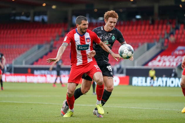 1.FC Heidenheim vs SV Werder Bremen - Relegation 02 - 06.07.2020 Norman Theuerkauf (1. FC Heidenheim 1846 30), Joshua Sargent (Werder Bremen 19) nphgm001: Fussball: 1. Bundesliga: Saison 19 20: Relegation 02; 1.FC Heidenheim vs SV Werder Bremen - 06.07.2020 Foto: gumzmedia nordphoto POOL DFL regulations prohibit any use of photographs as image sequences and or quasi-video. EDITORIAL USE ONLY National and international News-Agencies OUT. Heidenheim Voith-Arena BW DEUTSCHLAND