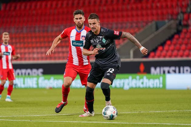 1.FC Heidenheim vs SV Werder Bremen - Relegation 02 - 06.07.2020 Marco Friedl (Werder Bremen 32) Stefan Schimmer (1. FC Heidenheim 1846 09) nphgm001: Fussball: 1. Bundesliga: Saison 19 20: Relegation 02; 1.FC Heidenheim vs SV Werder Bremen - 06.07.2020 Foto: gumzmedia nordphoto POOL DFL regulations prohibit any use of photographs as image sequences and or quasi-video. EDITORIAL USE ONLY National and international News-Agencies OUT. Heidenheim Voith-Arena BW DEUTSCHLAND