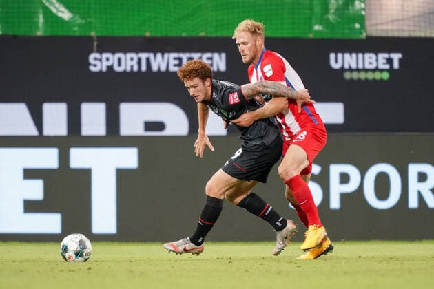 1.FC Heidenheim vs SV Werder Bremen - Relegation 02 - 06.07.2020 Sebastian Griesbeck (1. FC Heidenheim 1846 18), Joshua Sargent (Werder Bremen 19) nphgm001: Fussball: 1. Bundesliga: Saison 19 20: Relegation 02; 1.FC Heidenheim vs SV Werder Bremen - 06.07.2020 Foto: gumzmedia nordphoto POOL DFL regulations prohibit any use of photographs as image sequences and or quasi-video. EDITORIAL USE ONLY National and international News-Agencies OUT. Heidenheim Voith-Arena BW DEUTSCHLAND