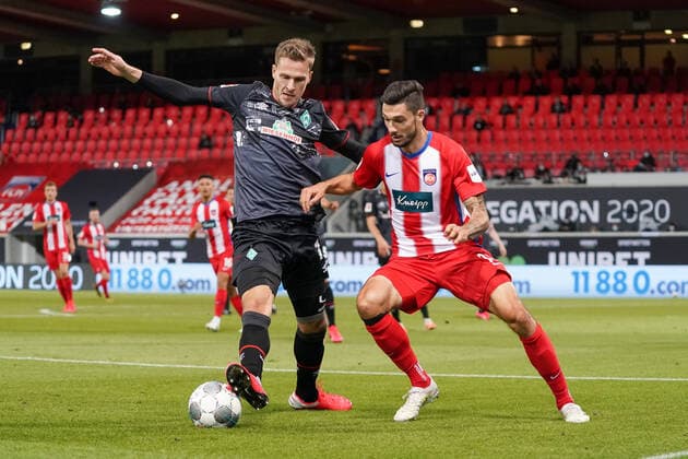 1.FC Heidenheim vs SV Werder Bremen - Relegation 02 - 06.07.2020 Sebastian Langkamp (Werder Bremen 15), Jonas David Otto (1. FC Heidenheim 1846 26) nphgm001: Fussball: 1. Bundesliga: Saison 19 20: Relegation 02; 1.FC Heidenheim vs SV Werder Bremen - 06.07.2020 Foto: gumzmedia nordphoto POOL DFL regulations prohibit any use of photographs as image sequences and or quasi-video. EDITORIAL USE ONLY National and international News-Agencies OUT. Heidenheim Voith-Arena BW DEUTSCHLAND