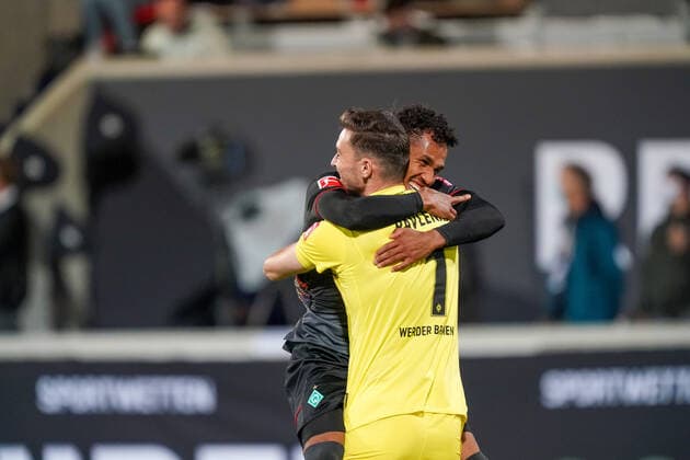 1.FC Heidenheim vs SV Werder Bremen - Relegation 02 - 06.07.2020 Jubel bei Jiri Pavlenka (Werder Bremen 01), Theodor Gebre Selassie (Werder Bremen 23) nphgm001: Fussball: 1. Bundesliga: Saison 19 20: Relegation 02; 1.FC Heidenheim vs SV Werder Bremen - 06.07.2020 Foto: gumzmedia nordphoto POOL DFL regulations prohibit any use of photographs as image sequences and or quasi-video. EDITORIAL USE ONLY National and international News-Agencies OUT. Heidenheim Voith-Arena BW DEUTSCHLAND