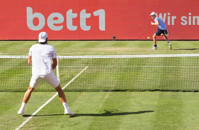 Tommy HAAS (GER) in his match against Jannik SINNER (ITA) , who hit the tennis ball between his legs ( Tweener ) at the Tennis bett1 ACES Tennis Tournament on grass in Berlin , July 13, 2020.