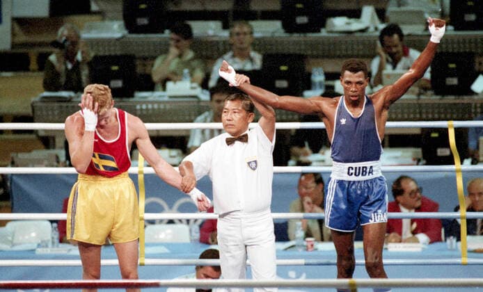 920803 Summer Olympics 1992, Boxing: Gold medalist Ariel Hernandez of Cuba (R) celebrate winning a match in middleweight against Soren Antman of Sweden at The Summer Olympic Games, Olympische Spiele, Olympia, OS on August 3, 1992 in Barcelona, Spain. BILDBYRAN  Copyright: BILDBYRAN BB920803BB014