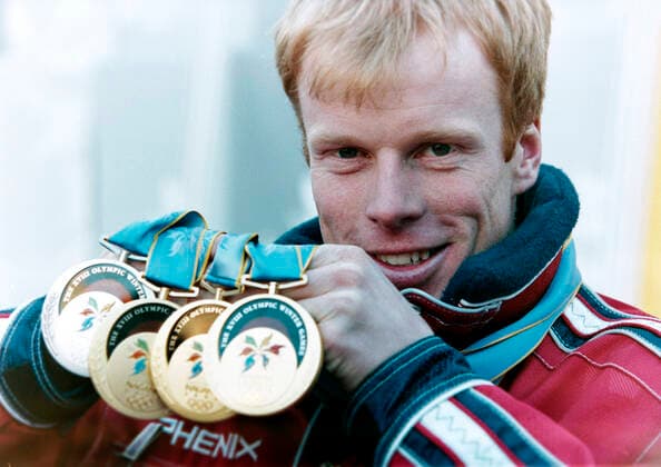 980222 Winter Olympics 1998, Cross Country Skiing: Gold medalist Bjorn Daehlie of Norway celebrate with all his olympic medals ( 3 gold, 1 silver) after 50 km freestyle at The Winter Olympic Games, Olympische Spiele, Olympia, OS on February 22, 1998 in Nagano, Japan. BILDBYRAN  Copyright: BILDBYRAN BB980222BB027