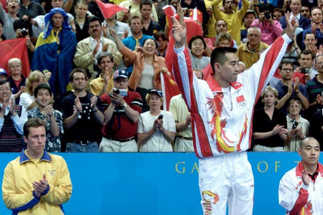 000925 Summer Olympics 2000, Table tennis, Tischtennis Gold medalist Kong Linghui of China is flanked by silver medalist Jan-Ove Waldner of Sweden (L) and bronze medalist Liu Guoliang of China at The Summer Olympic Games, Olympische Spiele, Olympia, OS on September 25, 2000 in Sydney, Australia. BILDBYRAN  Copyright: BJORNxLINDGREN BB000925BB055