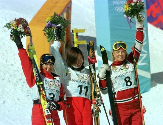 980211 Winter Olympics 1998, Freestyle Skiing: Gold medalist Tae Satoya of Japan is flanked by silver medalist Tatjana Mittermayer of Germany (L) and bronze medalist Kari Traa of Norway after womens freestyle moguls at The Winter Olympic Games, Olympische Spiele, Olympia, OS on February 11, 1998 in Nagano, Japan. BILDBYRAN  Copyright: PETERxKRÜGER BB980211PK016