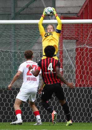 Standard s goalkeeper Arnaud Bodart fights for the ball during a friendly soccer game between Standard de Liege and OGC Nice, Saturday 25 July 2020 in Liege, in preparation of the upcoming 2020-2021 Jupiler Pro League season. VIRGINIExLEFOUR  x2521805x