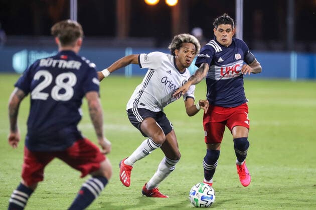 July 25, 2020: Philadelphia Union midfielder JOSE ANDRES MARTINEZ (8) competes for the ball against New England Revolution forward GUSTAVO BOU (7) during the MLS, Fussball Herren, USA is Back Tournament Philadelphia Union vs New England Revolution match at ESPN Wide World of Sports Complex in Orlando, Fl on July 25, 2020. - ZUMAk149 20200725_zsp_k149_010 Copyright: xCoryxKnowltonx