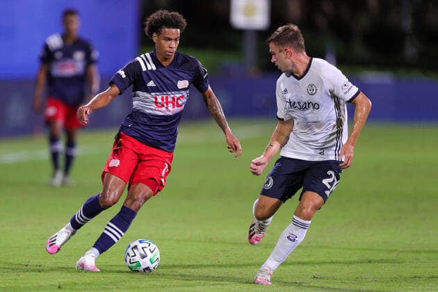 July 25, 2020, Orlando, FL, USA: ORLANDO, FL - JULY 25: New England Revolution forward Tajon Buchanan (17) controls the ball while Philadelphia Union defender Kai Wagner (27) defends during the soccer match between the Philadelphia Union and the New England Revolution on July 25, 2020, at ESPN Wide World of Sports Complex in Orlando, FL. ( Icon Sportswire) Orlando USA - ZUMAi88_ 20200725_zaf_i88_198 Copyright: xJoexPetrox