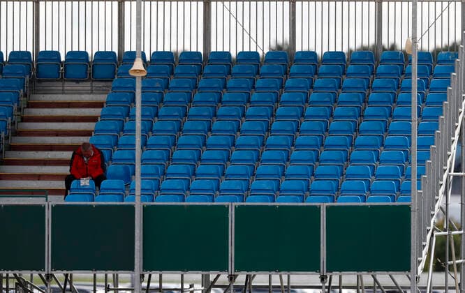 Motorsports: FIA Formula One World Championship, WM, Weltmeisterschaft 2020, Grand Prix of Great Britain Motorsports: FIA Formula One World Championship 2020, Grand Prix of Great Britain, A man seats in the empty stands