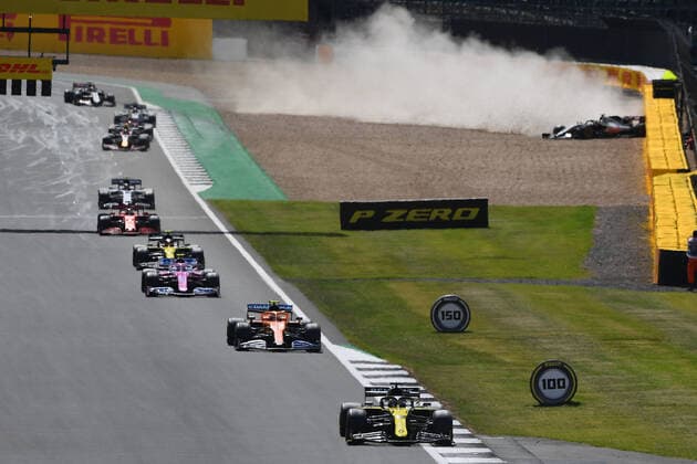 Motorsports: FIA Formula One World Championship, WM, Weltmeisterschaft 2020, Grand Prix of Great Britain Motorsports: FIA Formula One World Championship 2020, Grand Prix of Great Britain, 3 Daniel Ricciardo (AUS, Renault DP World F1 Team), 4 Lando Norris (GBR, McLaren F1 Team), 18 Lance Stroll (CAN, BWT Racing Point F1 Team), Crash of 20 Kevin Magnussen (DEN, Haas F1 Team) in the background