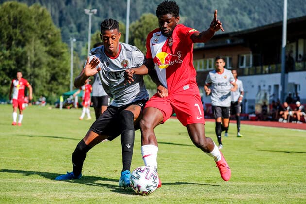 SOCCER - RBS vs Nice, test match ZELL AM SEE,AUSTRIA,08.AUG.20 - SOCCER - tipico Bundesliga, Ligue 1, Red Bull Salzburg vs OGC Nice, test match. Image shows Youcef Atal (Nice) and Sekou Koita (RBS). GEPAxpictures xJasminxWalter