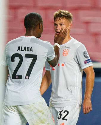 FC BAYERN MUENCHEN - FC Barcelona, Barca 8-2 , Football UEFA Champions League Lisbon, Lissabon, Portugal, 14th August 2020. Joshua KIMMICH, FCB 32 celebrates his 5-2 goal, happy, laugh, celebration, David ALABA, FCB 27 in the quarterfinal UEFA Champions League match final tournament FC BAYERN MUENCHEN - FC BARCELONA 8-2 in Season 2019 2020, FCB, Munich, Barca Photographer: Peter Schatz Pool - UEFA REGULATIONS PROHIBIT ANY USE OF PHOTOGRAPHS as IMAGE SEQUENCES and or QUASI-VIDEO - National and international News-Agencies OUT Editorial Use ONLY Lisbon Estadio da Luz de Benfica Portugal