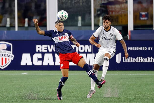 FOXBOROUGH, MA - AUGUST 20: Philadelphia Union defender Matt Real (32) clears the ball from New England Revolution forward Gustavo Bou (7) during a match between the New England Revolution and the Philadelphia Union on August 20, 2020, at Gillette Stadium in Foxborough, Massachusetts. (Photo by Fred Kfoury III Icon Sportswire) SOCCER: AUG 20 MLS, Fussball Herren, USA Philadelphia Union at New England Revolution Icon482200820006
