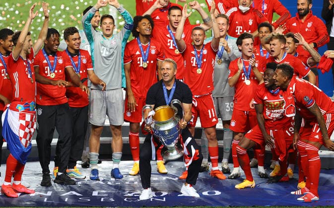 FOOTBALL : Paris Saint Germain vs Bayern Munich - Finale - UEFA Ligue des Champions - 23 08 2020 LISBON, PORTUGAL - AUGUST 23: Hans-Dieter Flick, Head Coach of FC Bayern Munich lifts the Champions League Trophy following his team s victory in the UEFA Champions League Final match between Paris Saint-Germain and Bayern Munich at Estadio do Lisboa e Benfica on August 23, 2020 in Lisbon, Portugal. Lisbonne Portugal