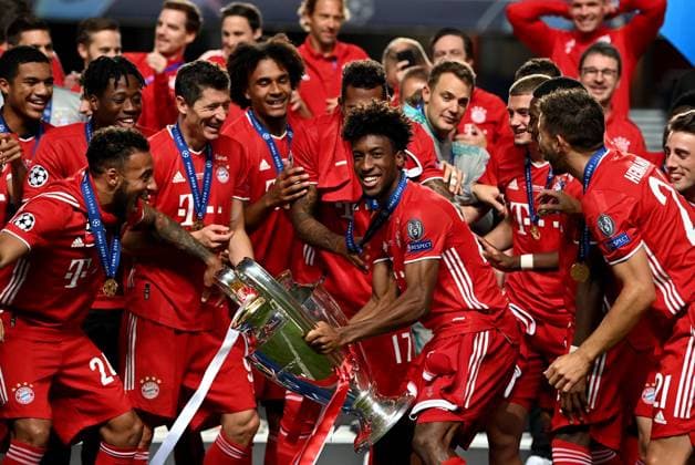 FOOTBALL : Paris Saint Germain vs Bayern Munich - Finale - UEFA Ligue des Champions - 23 08 2020 LISBON, PORTUGAL - AUGUST 23: Kingsley Coman of FC Bayern Munich celebrates with the UEFA Champions League Trophy following his team s victory in the UEFA Champions League Final match between Paris Saint-Germain and Bayern Munich at Estadio do Lisboa e Benfica on August 23, 2020 in Lisbon, Portugal. Lisbonne Portugal