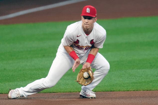 St. Louis Cardinals third baseman Tommy Edman makes a stop on a ball hit by Kansas City Royals Hunter Dozier in the first inning at Busch Stadium in St. Louis on Tuesday, August 25, 2020.  SLP2020082515 BILLxGREENBLATT