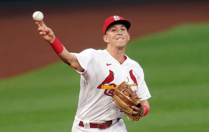 St. Louis Cardinals third baseman Tommy Edman makes the throw to first base on a ball hit by Kansas City Royals Hunter Dozier in the first inning at Busch Stadium in St. Louis on Tuesday, August 25, 2020.  SLP2020082516 BILLxGREENBLATT