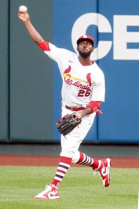 St. Louis Cardinals right fielder Dexter Fowler throws the baseball in after Kansas City Royals Ryan O Hearn connects for a single in the second inning at Busch Stadium in St. Louis on Tuesday, August 25, 2020.  SLP2020082518 BILLxGREENBLATT