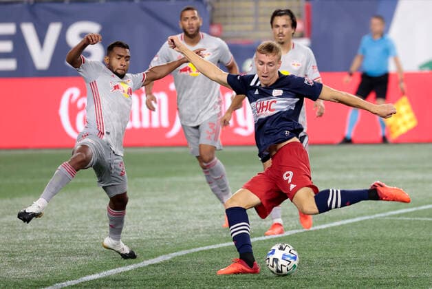 FOXBOROUGH, MA - AUGUST 29: New England Revolution forward Adam Buksa (9) gets a shot off defended by New York Red Bulls midfielder Cristian Casseres Jr. (23) during a match between the New England Revolution and New York Red Bulls on August 29, 2020, at Gillette Stadium in Foxborough, Massachusetts. (Photo by Fred Kfoury III Icon Sportswire) SOCCER: AUG 29 MLS, Fussball Herren, USA New York Red Bulls at New England Revolution Icon482200829021