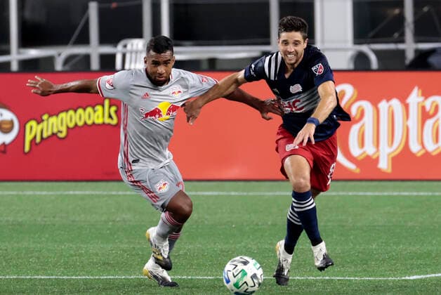 FOXBOROUGH, MA - AUGUST 29: New England Revolution defender midfielder Matt Polster (8) and New York Red Bulls midfielder Cristian Casseres Jr. (23) vie for the ball during a match between the New England Revolution and New York Red Bulls on August 29, 2020, at Gillette Stadium in Foxborough, Massachusetts. (Photo by Fred Kfoury III Icon Sportswire) SOCCER: AUG 29 MLS, Fussball Herren, USA New York Red Bulls at New England Revolution Icon482200829026