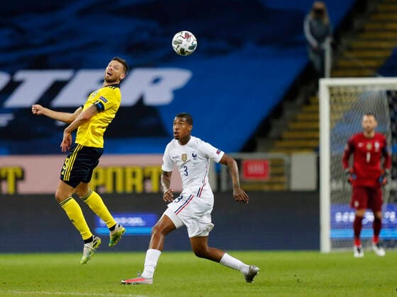 SwedenÂ s Marcus Berg and France s Presnel Kimpembe during the UEFA Nations League football match between Sweden and France at Friends Arena in Stockholm, Sweden September 05, 2020. Stockholm Sweden x10430x
