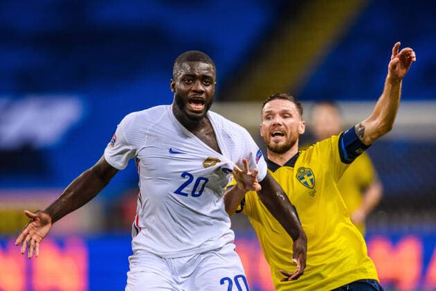 200905 Dayot Upamecano of France and Marcus Berg of Sweden during the Nations League football match between Sweden and France on September 5, 2020 in Stockholm. Photo: Joel Marklund BILDBYRAN kod JM JM0013 bbeng fotboll fotball football soccer landskamp nations league sverige sweden sverige a frankrike france Copyright: JOELxMARKLUND BB200905JM118
