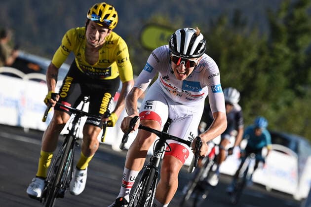 Primoz Roglic of Team Jumbo - Visma wearing the yellow jersey and Tadej Pogacar of UAE Team Emirates sprints to the finish of stage 15 of the 107th edition of the Tour de France cycling race from Lyon to Grand Colombier (174,5 km), in France, Sunday 13 September 2020. This year s Tour de France was postponed due to the worldwide Covid-19 pandemic. The 2020 race starts in Nice on Saturday 29 August and ends on 20 September. DAVIDxSTOCKMAN  x2543059x
