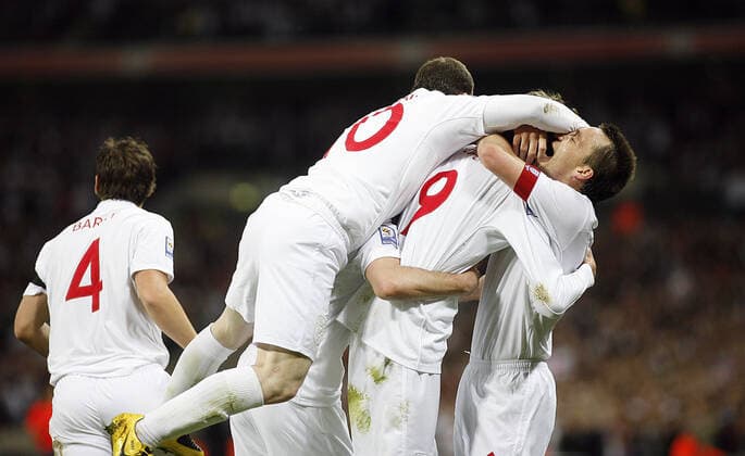 Players Jump On Peter Crouch England V Ukraine England V Ukraine Wembley Stadium, London, England 01 April 2009 Players Jump On Peter Crouch England V Ukraine England V Ukraine Wembley Stadium, London, England 01 April 2009  Copyright: Allstar RichardxSelle 12779441